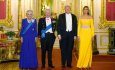 Kraliça və Melaniya geyimləri ilə Putinə mesaj verdilər