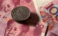 Yuan dollara qarşı yenə ucuzlaşdı