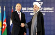 Putin Ruhani ilə Suriyanı müzakirə etdi