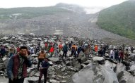 Çində torpaq sürüşməsi: 141 nəfər dağıntı altında qalıb