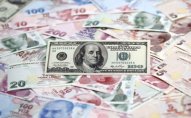 Türk lirəsi dollar qarşısında dəyər qazanır