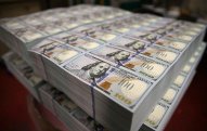 Dollar dünya valyutalarına qarşı ucuzlaşır