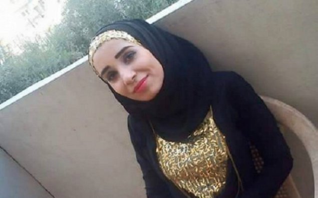 İŞİD qadın jurnalistin başını kəsdi   - VİDEO