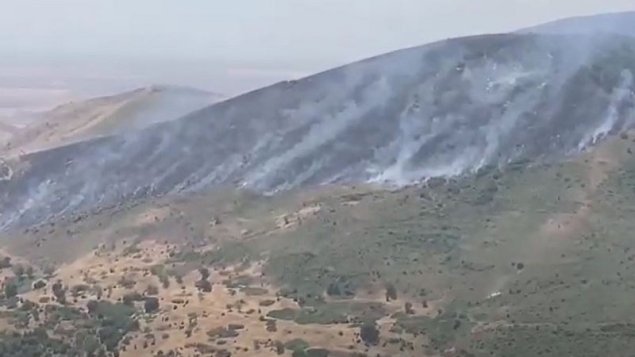 Minalanmış ərazidə yanğın başladı, helikopter göndərildi (VİDEO)