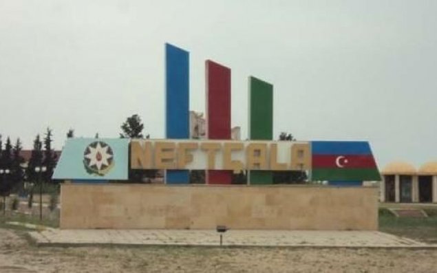 Neftçalada axund qara bayrağı polisə təhvil verdi